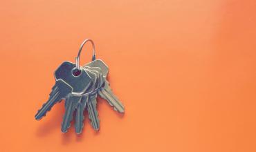 Inspections You Never Knew You Might Need House keys on an orange background