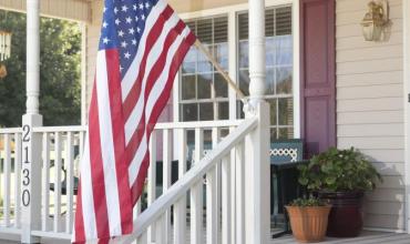 a house with an American flag in front