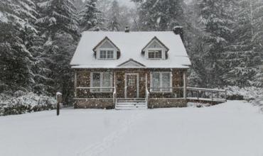 Winterize Your Home A house covered in snow