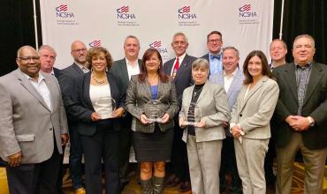 Agency Wins Three Awards at the NCSHA Annual Awards for Program Excellence NCHFA staff holding their trophies