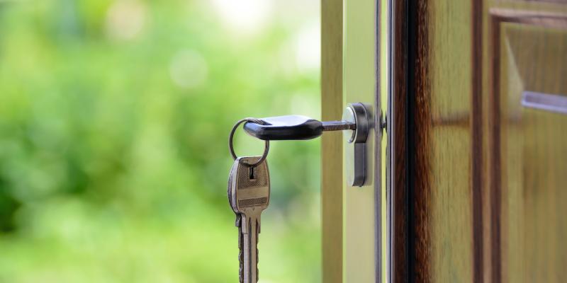 Veterans with Military-related Disabilities Face Significant Housing Barriers Key in a door with greenery background