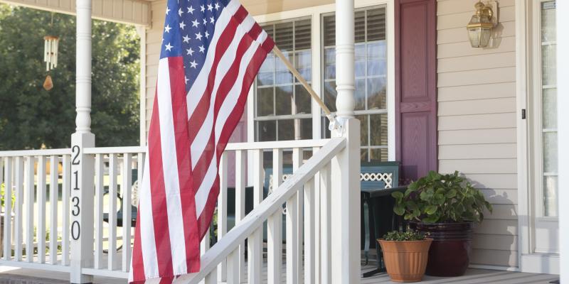 How to Entertain for the Big Game in Your Small Space American flag on a front porch