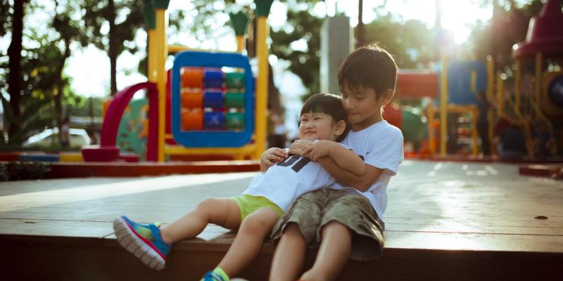How Home Ownership Can Lead to Financial Independence two kids on a playground